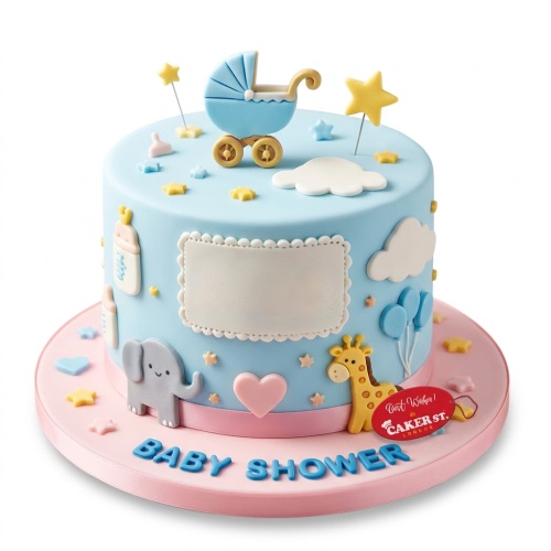 Blue baby shower cake with pram, stars, clouds, baby bottles, elephant, giraffe, balloons, and a blank message plaque.