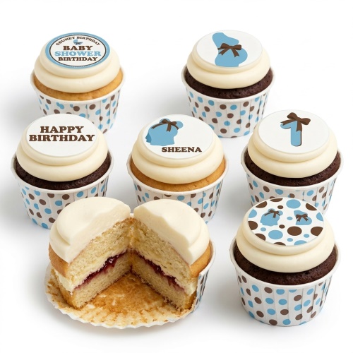 Assortment of baby shower cupcakes for boys with blue and brown bow tie and polka dot designs.