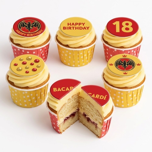 Bacardi themed birthday cupcakes with yellow and red icing, featuring Bacardi logo and custom age toppers