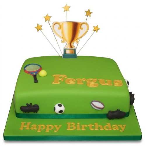 Green two-tiered sports theme birthday cake with a golden trophy, stars, tennis racket, football, rugby ball, and football boots.