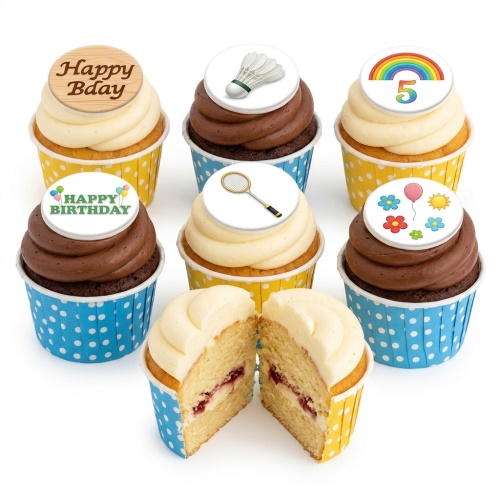 Assorted birthday cupcakes with vanilla and chocolate frosting, featuring custom age, badminton, rainbow, and 'Happy Birthday' toppers.