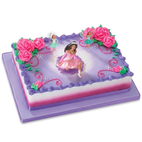 Square ballerina themed birthday cake with purple, pink, and white icing, decorated with ballerina figurines and pink roses.