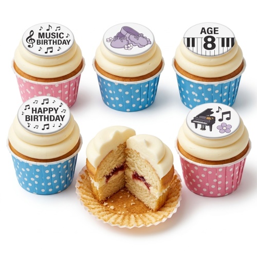 Cupcakes with white frosting, music notes, piano, ballet shoes, and custom age toppers in pink and blue wrappers.
