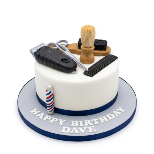 Round white barber shop themed birthday cake with clipper, scissors, comb, brush, and barber pole decorations.
