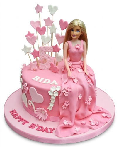 Pink Barbie doll birthday cake with hearts, stars, and custom age topper.
