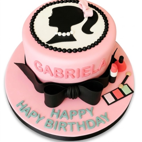 Pink birthday cake with black Barbie silhouette, pearl necklace, pink bow, black ribbon, and edible makeup decorations.