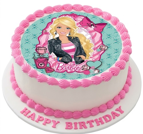 Round white birthday cake with a Barbie edible image and pink icing borders.