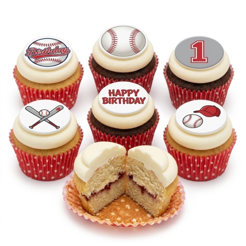 Baseball themed birthday cupcakes with white frosting, red polka dot cases, and edible toppers.