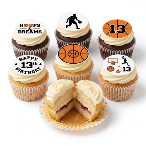 Set of basketball themed cupcakes with white and chocolate frosting, featuring edible toppers with basketballs, players, hoops, and 'Hoops & Dreams' and 'Happy 13th Birthday' messages.