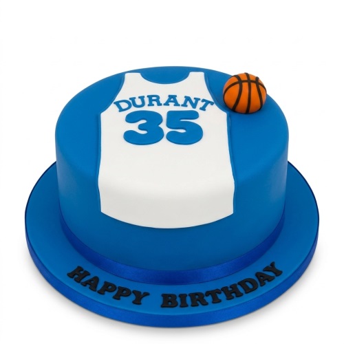 Round blue cake with a white basketball jersey design, a small orange basketball, and 'Happy Birthday' text.