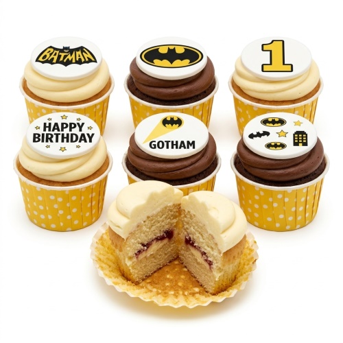 Batman themed cupcakes with various logos, Gotham text, Happy Birthday message, and a number 1 topper.