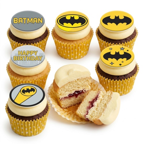 A selection of Batman themed cupcakes with yellow and black Bat-Signal toppers and 'Batman' and 'Happy Birthday' messages.