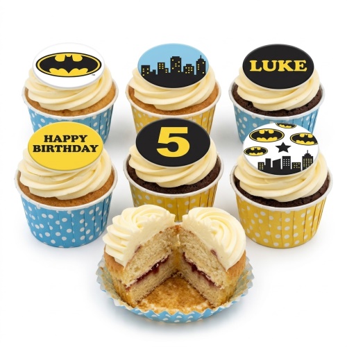 Batman themed birthday cupcakes with city skyline, Batman logo, "Happy Birthday", custom age, and personalised name toppers.