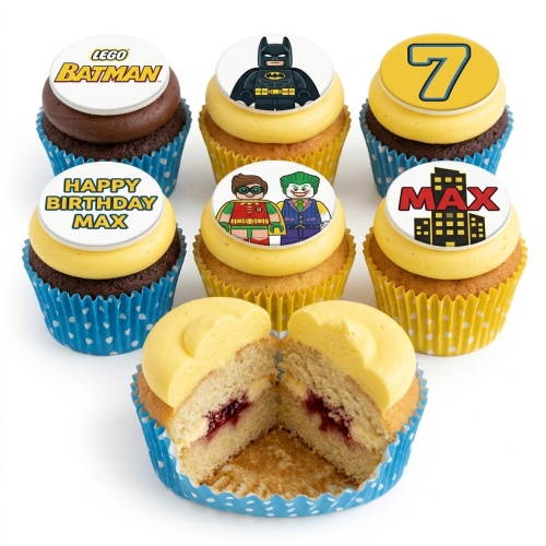 Lego Batman themed birthday cupcakes with superhero characters and custom age topper.