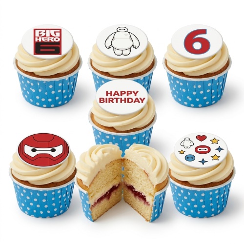 Big Hero 6 Baymax themed birthday cupcakes with custom age and Happy Birthday toppers in blue polka dot cases.