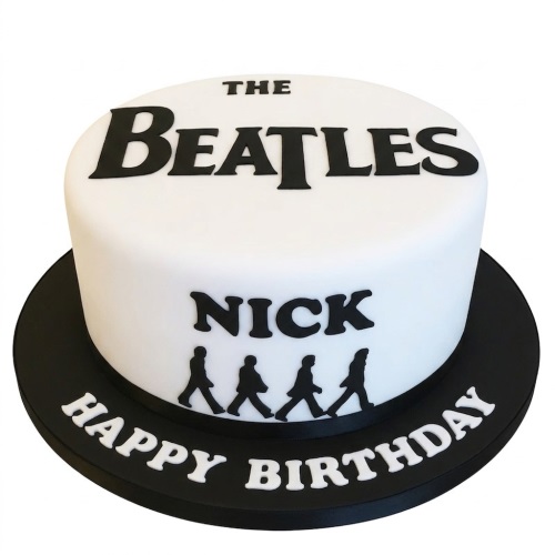 White round cake with black "The Beatles" logo and Abbey Road band silhouettes. Personalised name and "Happy Birthday" message on board.