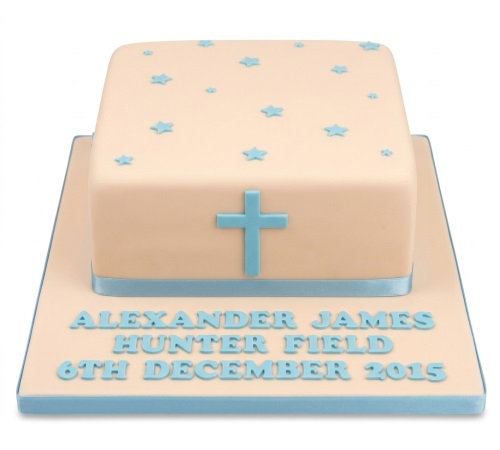 Square christening cake for a baby boy with blue stars, cross, and personalised message.