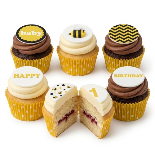 Six bee theme birthday cupcakes with yellow and black decorations and custom age topper.