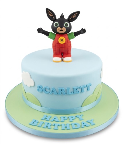 Round blue cake with a 3D Bing Bunny topper, white clouds, and a personalised birthday message.