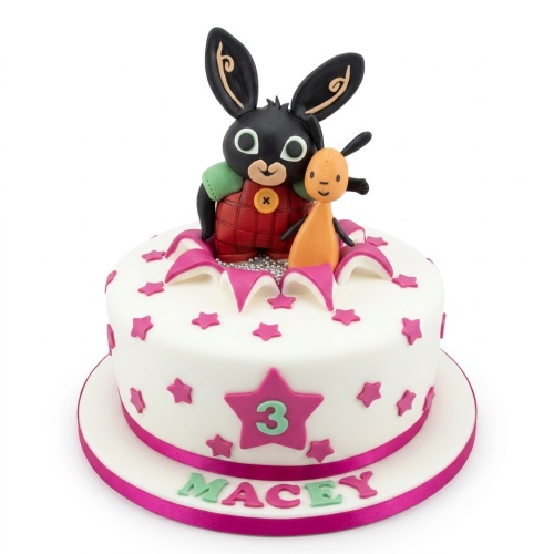 White round Bing Bunny and Flop birthday cake with pink stars, custom age topper, and personalised name.