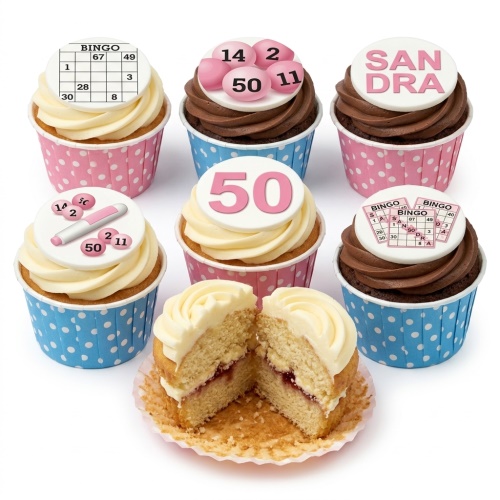 A selection of vanilla and chocolate cupcakes with bingo-themed edible toppers, including bingo cards, bingo balls, and a custom age topper.