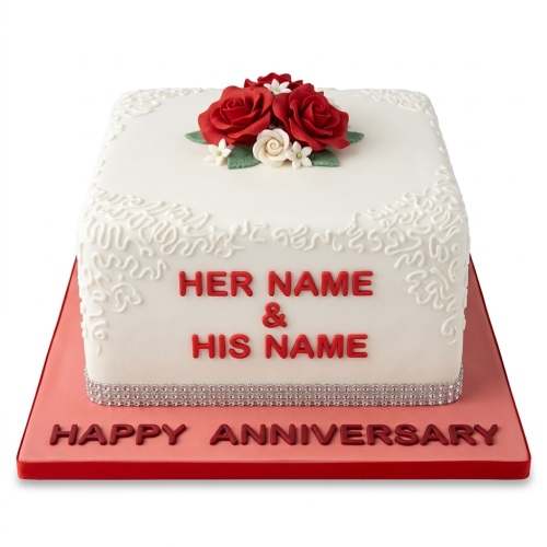 White square anniversary cake with red and white sugar roses and custom message.
