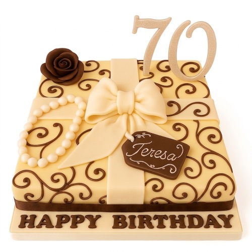 Elegant gift box style birthday cake with cream and brown fondant, a bow, chocolate rose, edible pearl necklace, and custom age topper.
