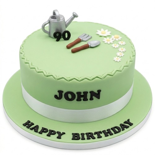 Light green round cake with edible watering can, spade, fork, white daisies, custom age topper, and personalised name.