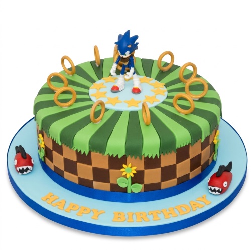 Round Sonic Hedgehog birthday cake with rings, stars, and enemy characters on a green and brown base.