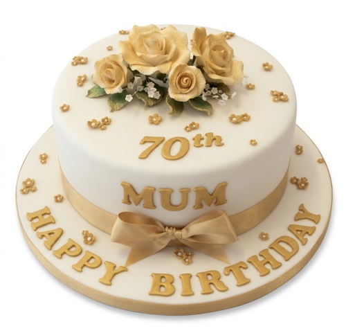 White birthday cake with gold sugar roses, gold ribbon, and customisable gold '70th MUM HAPPY BIRTHDAY' lettering.