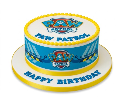 Round Paw Patrol themed birthday cake with blue, red, and yellow decorations, featuring the Paw Patrol logo and 'Happy Birthday' message.