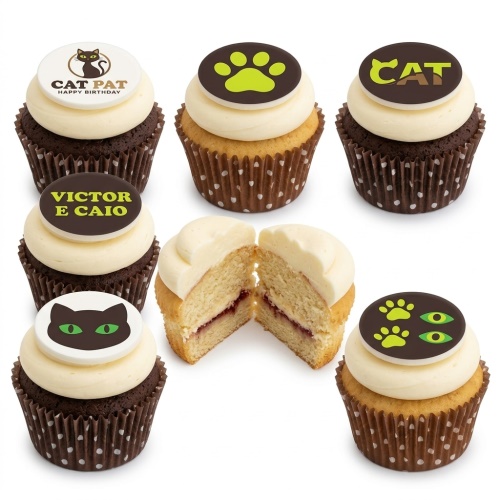 Chocolate and vanilla cupcakes with white frosting and cat-themed edible toppers, featuring cat faces and paw prints.