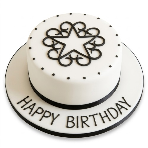 Elegant white single-tier birthday cake with black star design, scrollwork, and 'Happy Birthday' message.