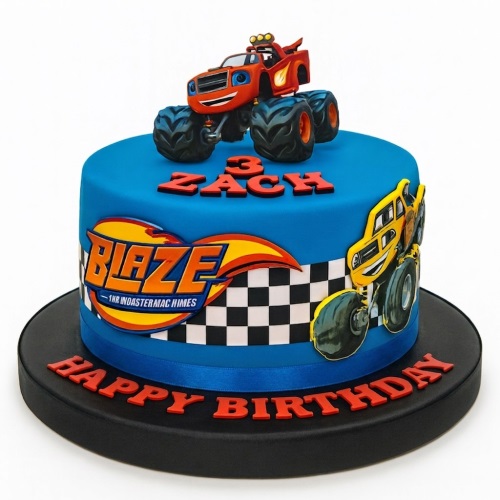 Blue round cake with Blaze monster truck topper, checkered flag, and yellow monster truck cutout.
