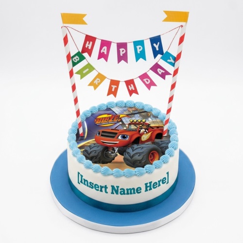 Round white birthday cake with Blaze and the Monster Machines edible image and blue icing border.