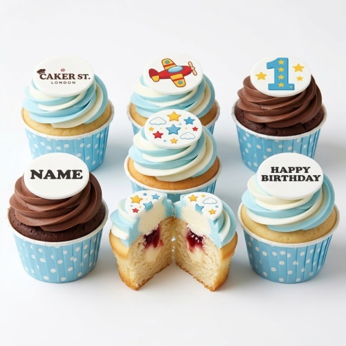 Cupcakes with blue and white frosting, featuring aeroplane, stars, and custom age/name toppers.