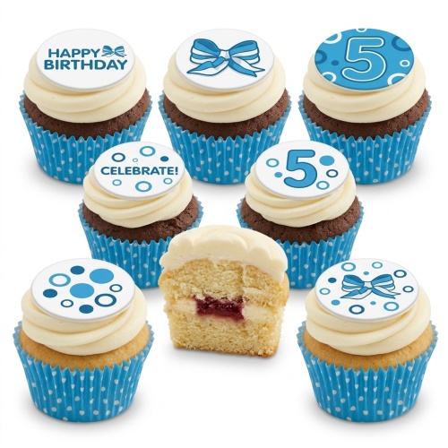 Blue and white birthday cupcakes with bow, polka dot, and custom age toppers.