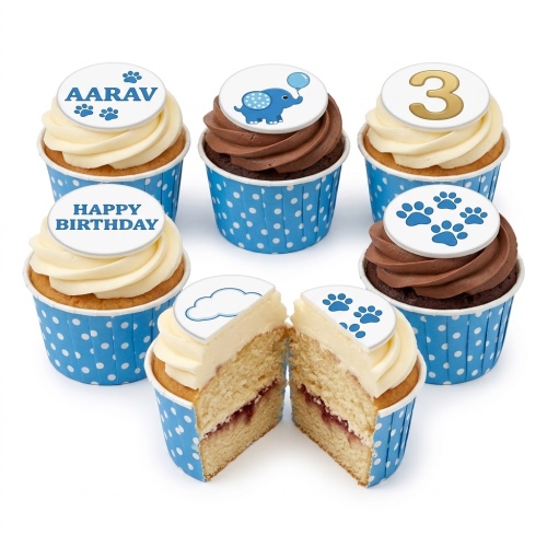 Six cupcakes with blue polka dot cases, featuring elephant, paw print, and custom age toppers.