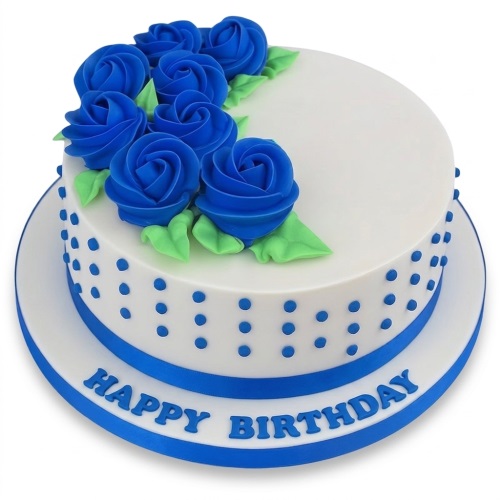 Round white birthday cake with blue fondant roses, green leaves, blue polka dots, and "Happy Birthday" message.