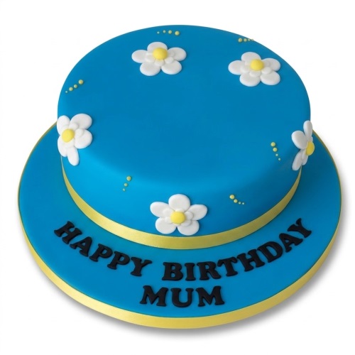 Round blue birthday cake with white and yellow daisy decorations and a yellow ribbon.