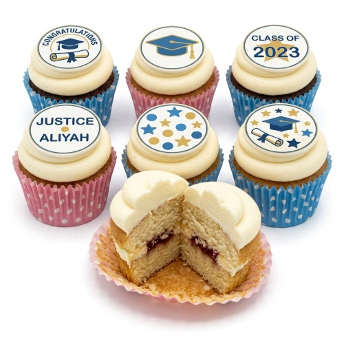 Graduation cupcakes with white frosting, blue and gold graduation cap and scroll toppers, and custom year.