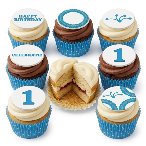 A selection of blue polka dot birthday cupcakes with white toppers, featuring 'Happy Birthday', 'Celebrate!', and the number 1.