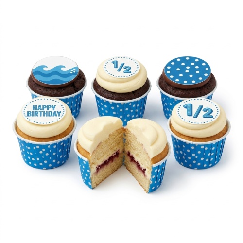 Blue and white half birthday cupcakes with '1/2' and wave toppers.