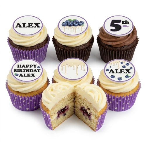 Six blueberry-themed birthday cupcakes with white frosting and purple wrappers. Some have custom name and age toppers.