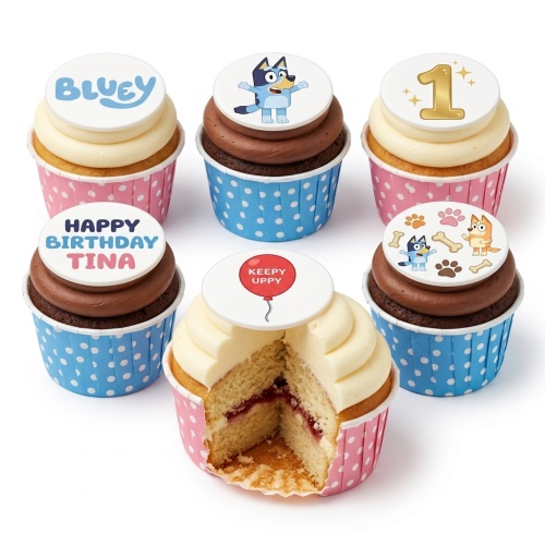 Selection of Bluey themed cupcakes with character, logo, paw print, number 1, and custom message toppers.