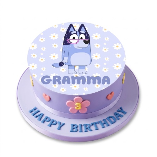 Round single-tier purple Bluey themed birthday cake with a Bluey character, daisies, hearts, and a custom age flower.