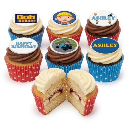 Bob the Builder themed cupcakes with edible toppers, including Bob, logo, and construction vehicles, in red and blue cases.