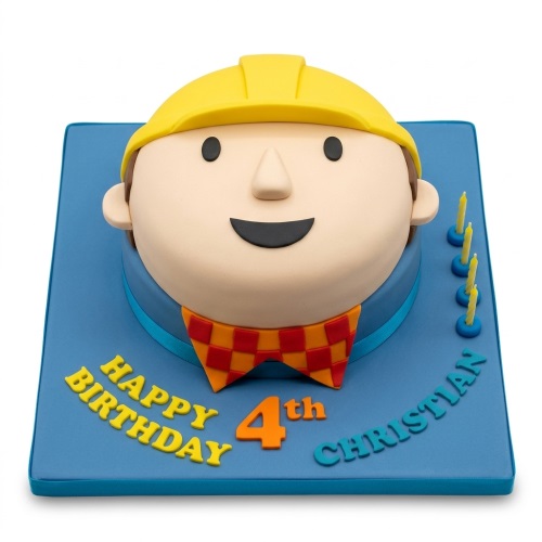 3D Bob the Builder head birthday cake with yellow hard hat and custom age topper on a blue base.