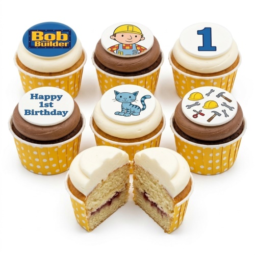 Bob the Builder cupcakes with character, logo, construction tools, and a blue cat topper in yellow polka dot wrappers.