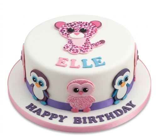 Round white birthday cake with pink leopard, owl, and penguin characters. Features a custom name and "Happy Birthday" message.